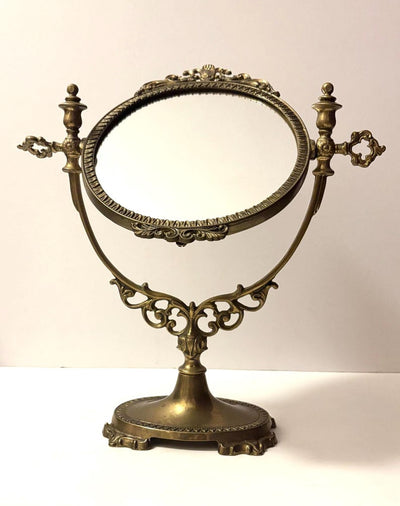 This mirror is absolutely stunning, amazing details and intricate metal work. L