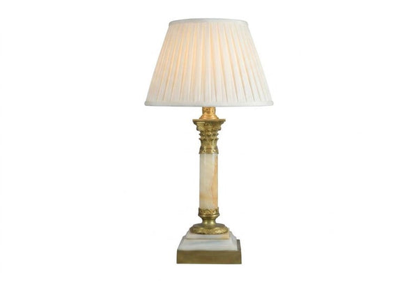 A beautiful early 20th-century table lamp crafted from elegant marble and richly detailed gilt bronze mounts.