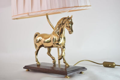 Bring equestrian elegance into your home with this vintage brass horse table lamp
