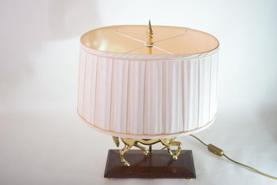 Bring equestrian elegance into your home with this vintage brass horse table lamp