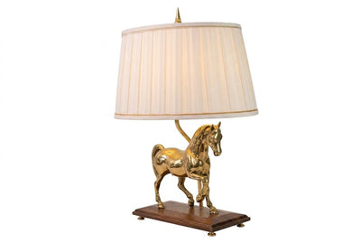 Bring equestrian elegance into your home with this vintage brass horse table lamp